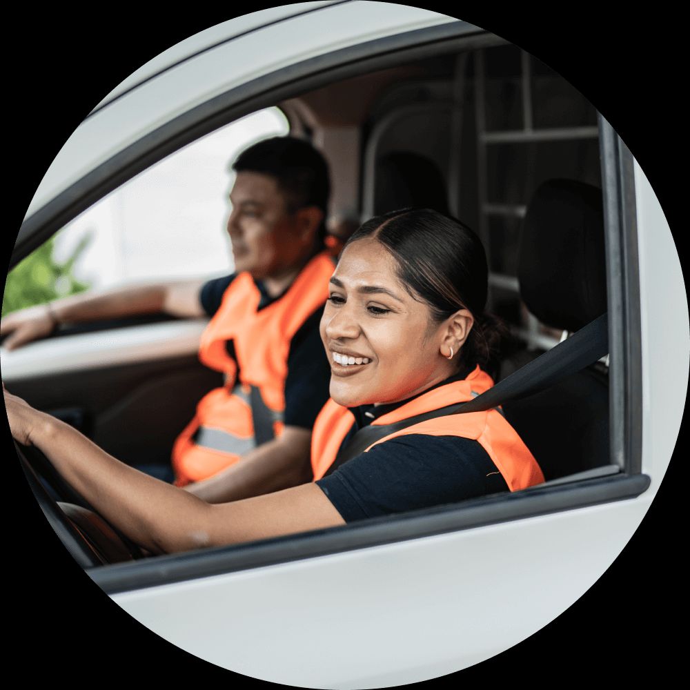 person in car smiling