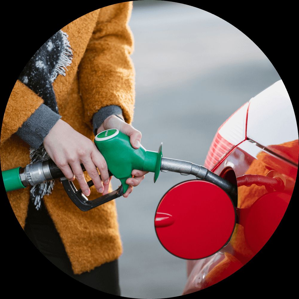person filling fuel tank
