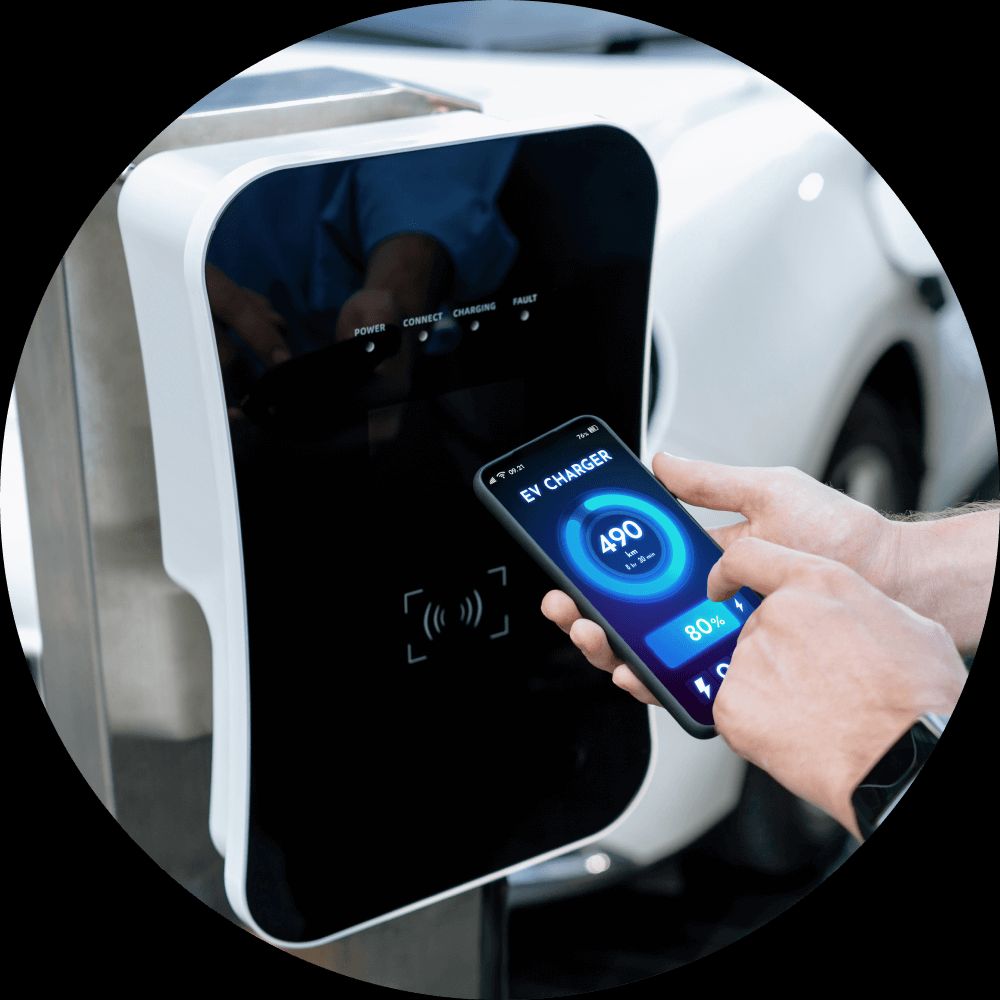 person checking battery charge on ev meter